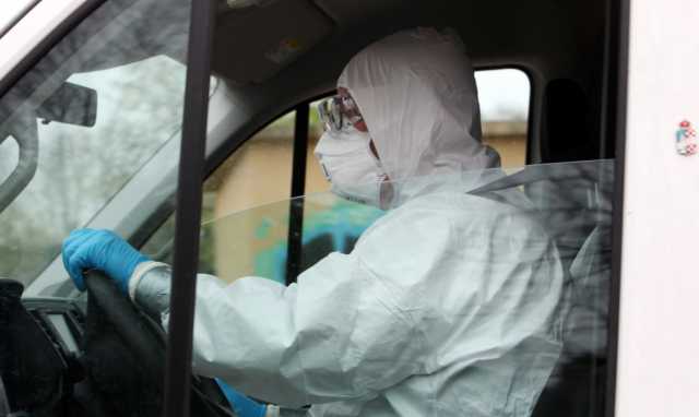 In Auto Tuta Mascherina