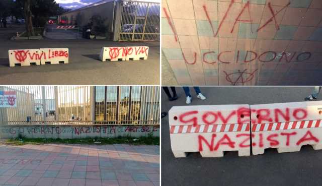 Le scritte no vax davanti alla Fiera di Cagliari