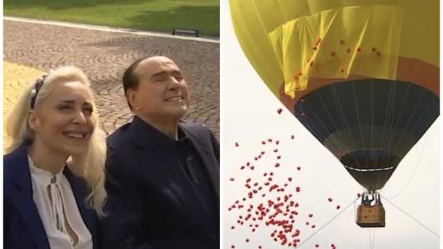 Berlusconi compie 86 anni, mongolfiera e dedica in volo: la sorpresa della fidanzata (video)