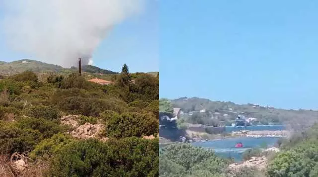 Incendio vicino alle case a Carloforte: elicottero Super Puma in volo